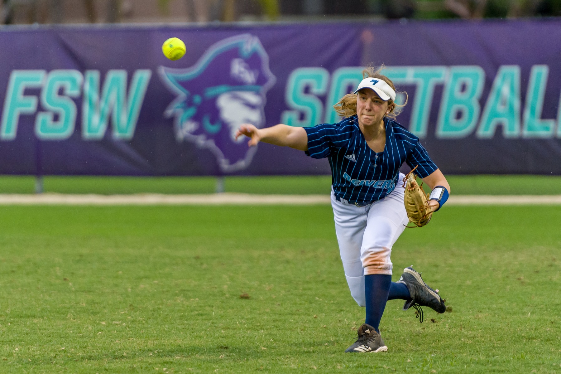 Emily Jacobs gets the ball back into the infield against #1 Florida Southwestern.

PHOTO COURTESY OF CAPTIVEPHOTONS.COM